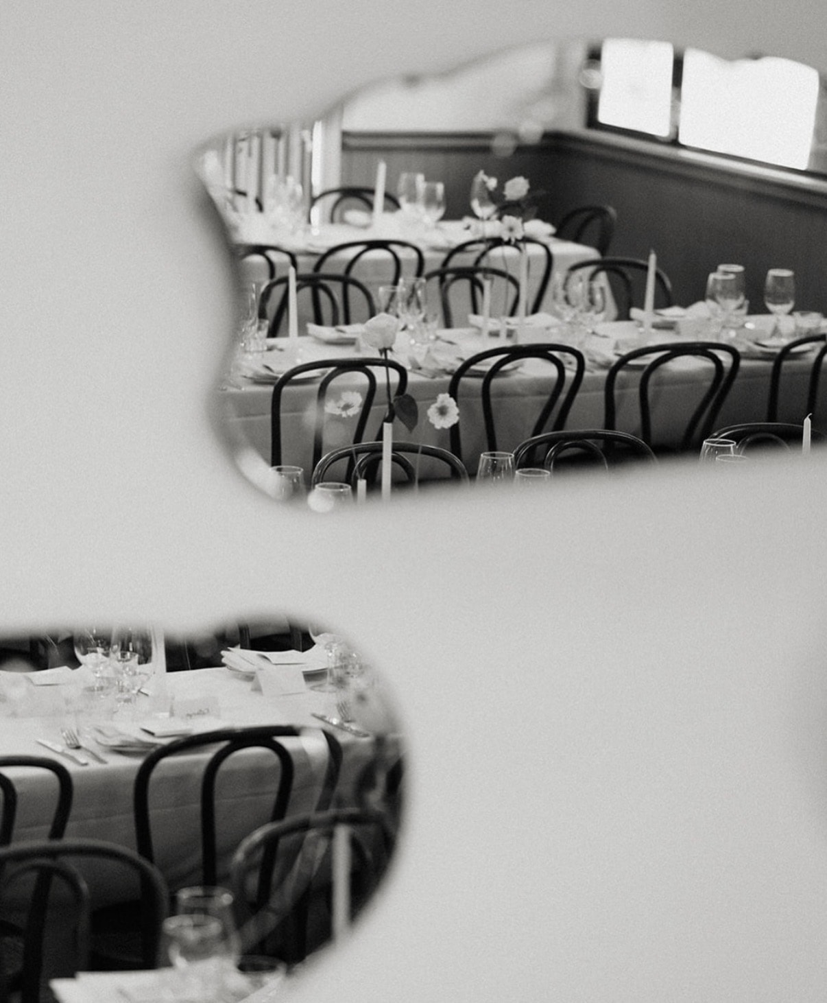 Elegant wedding place setting with crystal glassware and linen